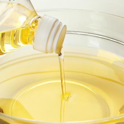 Cooking oil being poured into a bowl.