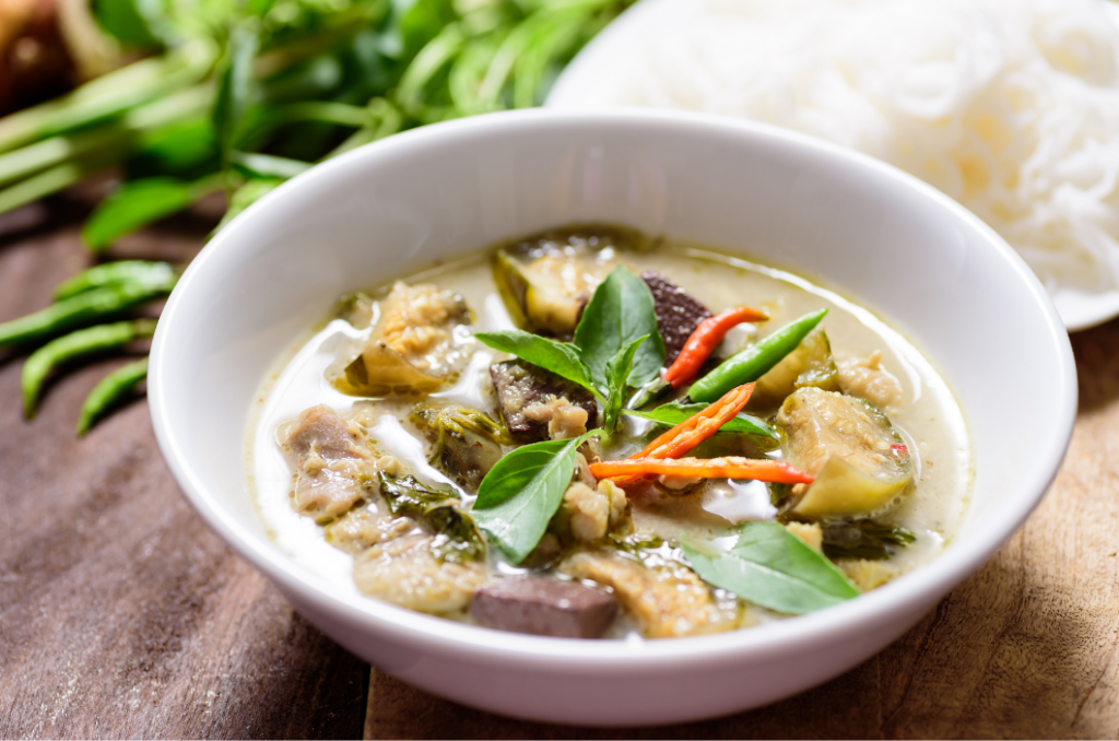 Beautiful bowl of Thai vegetable curry with chicken.