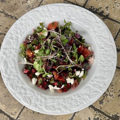 Beautiful salad with beets an goat cheese.